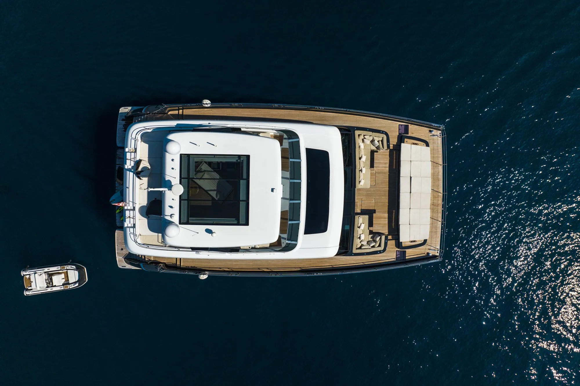 MANTA seen from directly above, both hulls and the tender alongside
